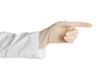Doctor in medical glove pointing on white background