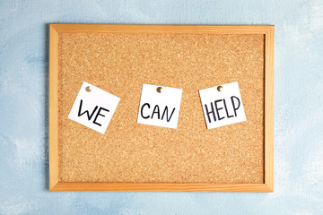 Cork bulletin board with pinned words 