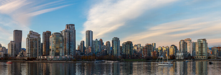 Fototapeta na wymiar Downtown Vancouver Panorama with wispy clouds in the sky