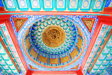 Elegant color wooden sculpture on ceiling，Beihai Park，Beijing, China