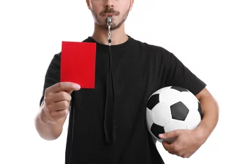 Foto op Canvas Football referee with ball and whistle holding red card on white background, closeup © New Africa