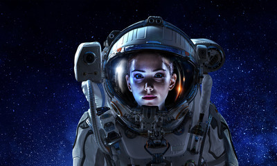 Attractive woman in spacesuit