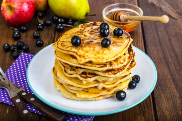 Sweet american pancakes with berries and fruits