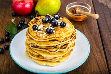 Sweet american pancakes with berries and fruits