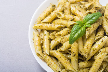 Italian penne pasta with sauce pesto