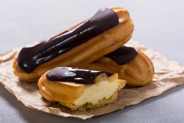 French dessert eclair with chocolate .