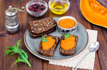 Vegetable caviar from pumpkin and zucchini on wooden table