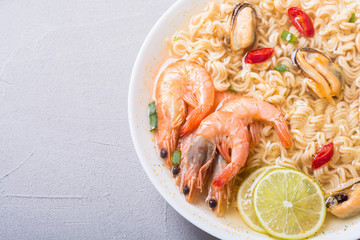Instant noodles soup with shrimps and mssels . Asian food