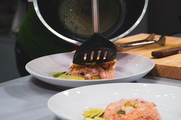 Chef preparing food, meal, in the kitchen, chef cooking, Chef decorating dish, closeup, .Chef preparing food, meal, in the kitchen, chef cooking, Chef decorating dish, closeup, .