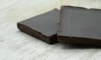 Close up dark chocolate in square pieces