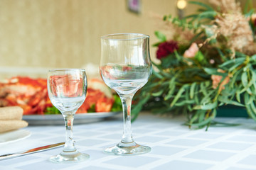 Close up picture of empty wine glasses in restaurant.