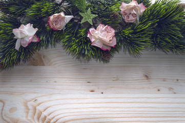 fir tree branches border with roses