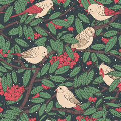 Hand drawn vector seamless pattern with birds, branches, leaves and rowanberry on black dotted background. Snowy winter decoration ornament for fabric, textile, covers or wrapping paper.