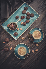 Two cup of coffee and with chocolate cookies