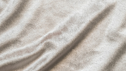 Beige gold velvet background or velour flannel texture made of cotton or wool with soft fluffy...