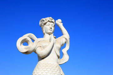 Fototapeta na wymiar mermaid sculpture in the Beihe Park on december 26, 2013, Luannan County, Hebei Province, China.