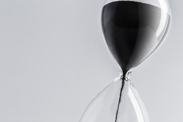 Close up hourglass on table