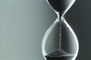 Hourglass on dark background