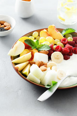 Healthy food table fruit breakfast natural yoghurt bowl