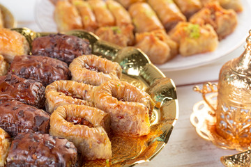 Traditional eastern arabic dessert Baklava with Turkish honey and walnuts, selective focus. Copy space