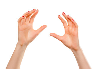 Close-up of beautiful woman's hands, palms up. Isolated on white background