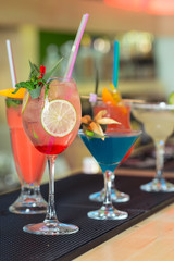 bar counter Cocktails drinks selection multicolored summer drinks