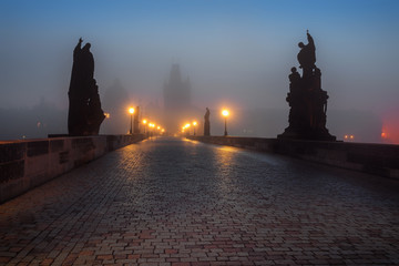 On the famous Charles Bridge in the morning mist, Prague, Czech Republic, Europe