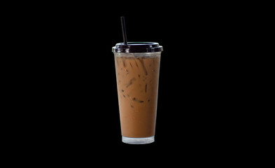 Iced coffee in a glass jar on  black background.
