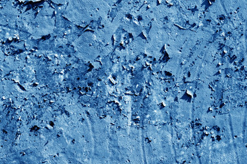 Grungy cement wall texture in navy blue tone.