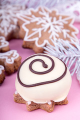 Christmass New Year decorations. Greeting card. White chocolate candy, gingerbread cookies. Tender pink color. Vintage style.