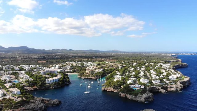 Flight over the bay of Cala D'or and Cala Ferrera in Mallorca