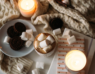 Fototapeta na wymiar Cozy home winter arrangement, cocoa with marshmallows, homemade 
