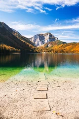  Beautiful lake in autumn Alps mountains, Austria. © smallredgirl