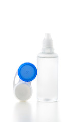 white bottle with contacts case