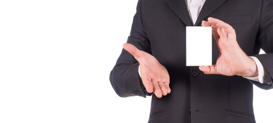 cropped shot of businessman in suit showing business card in hands