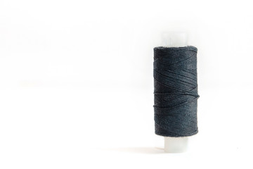 one skein of black thread isolated on white background