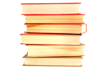 stack of books with a red cover isolated on white background