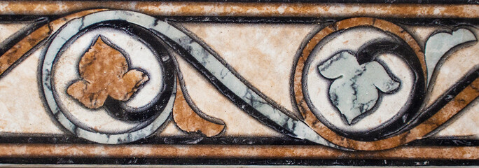 Detail of the traditional tiles from facade of old house. Decorative tiles.Valencian traditional tiles. Floral ornament.