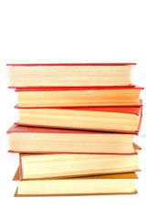 stack of books with a red cover isolated on white background