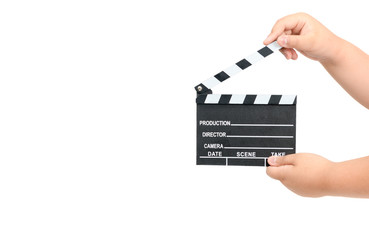 Naklejka premium Child holding movie clapper isolated on white
