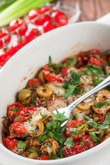 Casserole with mediterranean style baked fish with vegetables