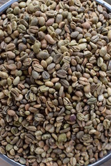 Raw Coffee beans close up backgrounds textures