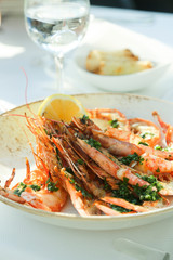 Fried shrimps with garlic and herbs