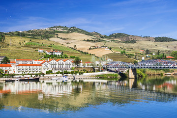 Fototapeta na wymiar Pinhao town with Douro river and vineyards in Douro valley, Portugal