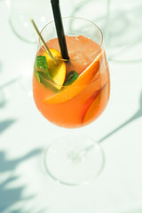 Peach mint cocktail, outdoors