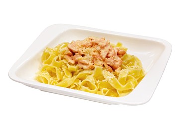 Italian pasta in a plate on a white background