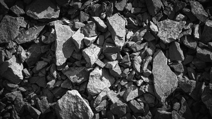 rubble texture natural abstract dark black and white vignette background close-up
