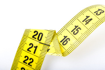 Measuring tape of the tailor for you design. On white background