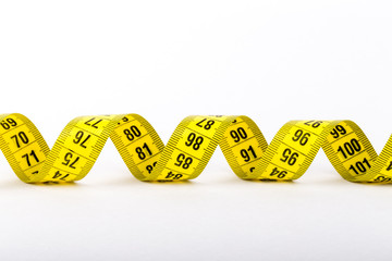 Measuring tape of the tailor for you design. On white background