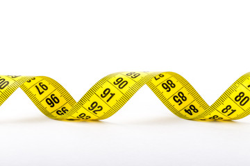 Measuring tape of the tailor for you design. On white background